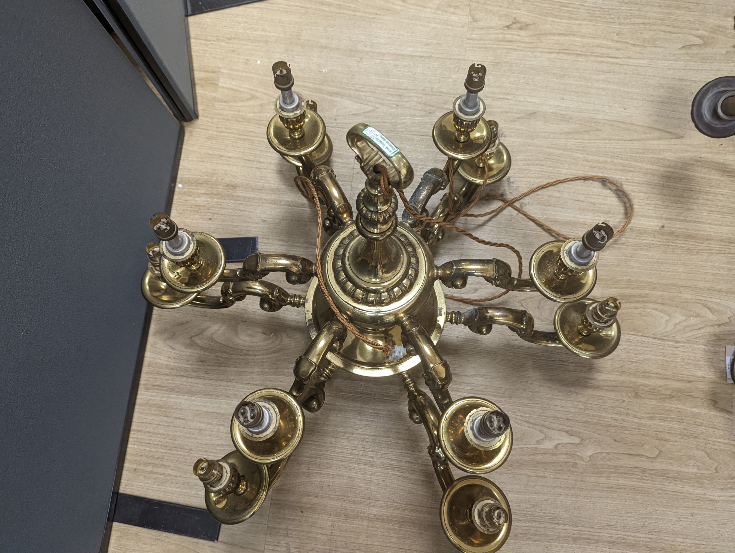 A brass 12-light chandelier